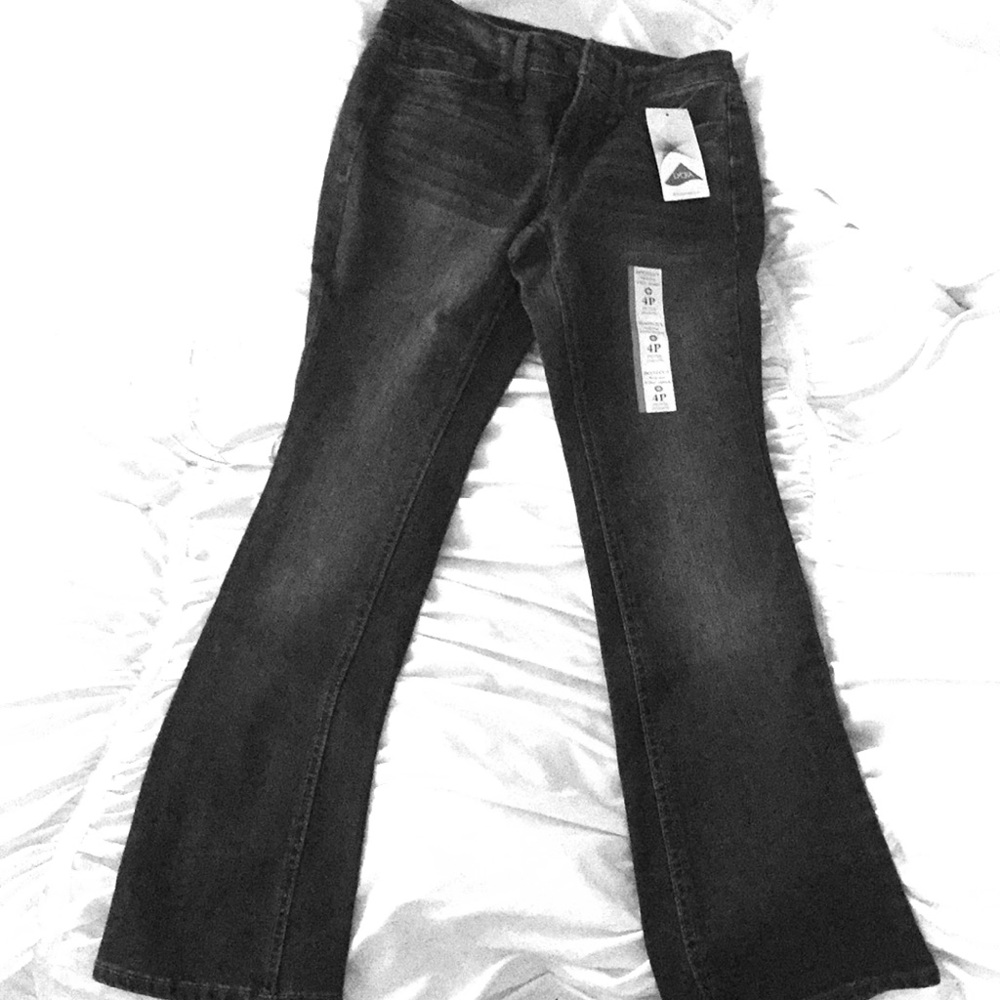 Size 4. Bootcut jeans. New. Never worn.